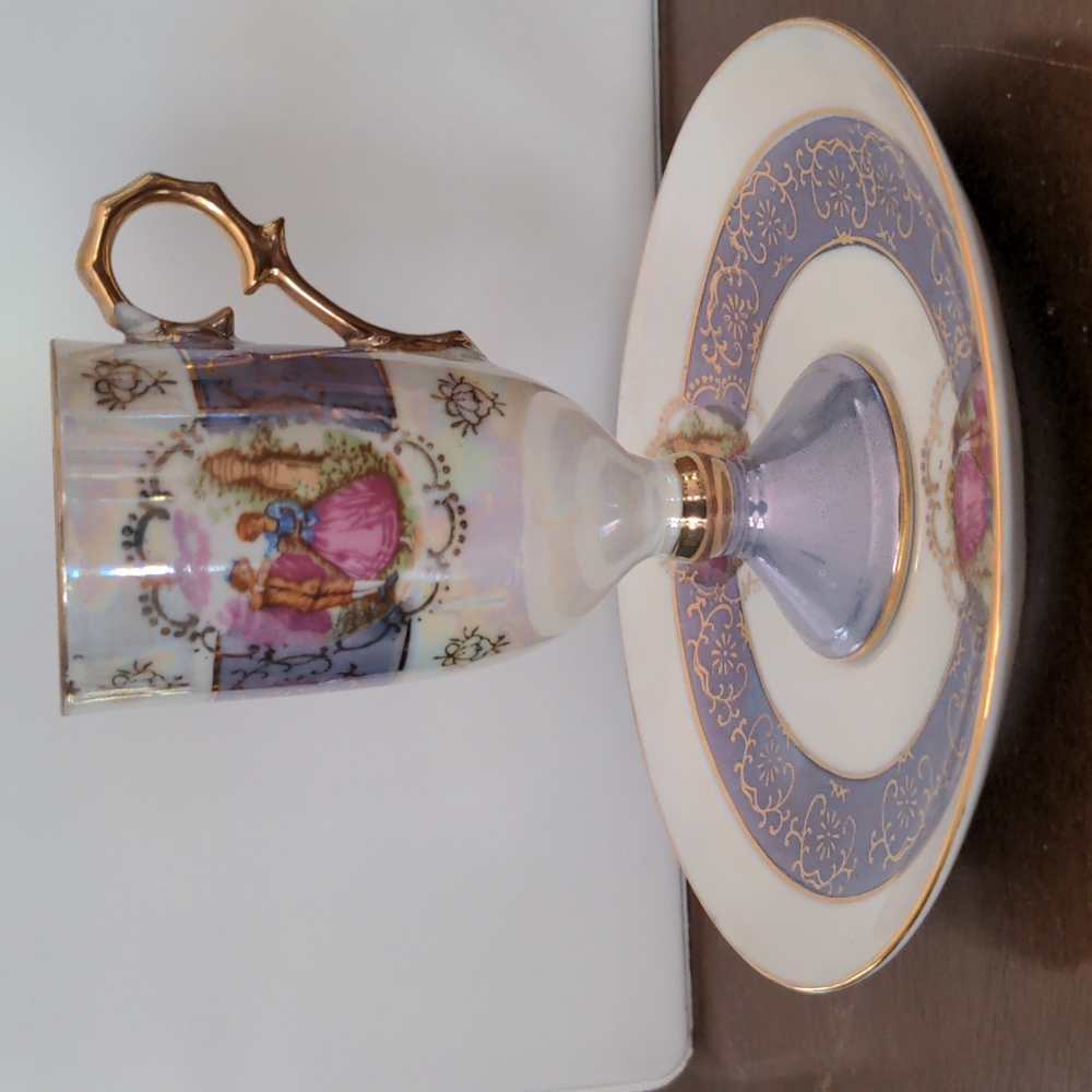 Antique demitasse 8 piece cup and saucer set.